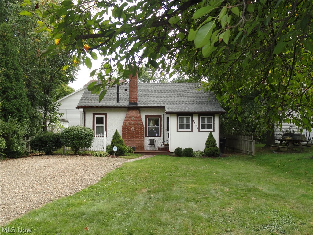 This 2 bedroom 1 bath home is as charming as can be!  Sitting on the back of the lot offers a nice big front yard.  Cozy living room with fireplace and formal dining room, nice sized kitchen and first floor laundry.  Newer roof, windows & electric.  Clean, neat and a pleasure to show!