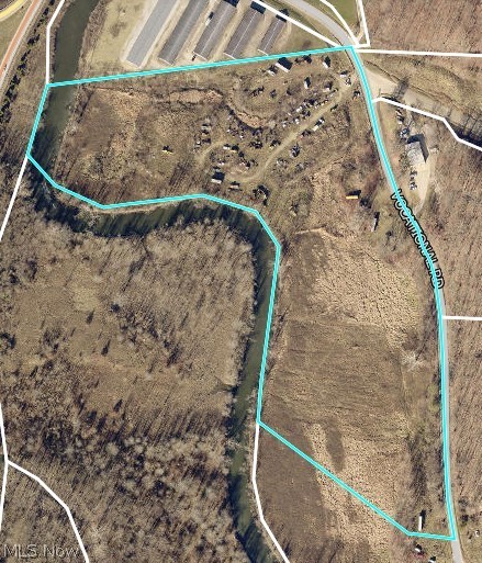11 acres to be surveyed from parcel 11-0002934.000. This property is conveniently located next to Interstate 77 and holds many possibilities for a new owner. Owner does not own mineral rights and will need ample time to remove equipment from the property. An adjoining approximately 5 acres is separately available if more land is desired.