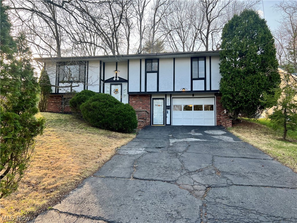 "Pride of ownership shines in this meticulously maintained 4 bedroom home. From the pristine 2.5 bathrooms to the updated mechanical systems, every inch of this property reflects a high standard of care. Truly turn-key and ready for its next chapter" The kitchen has been updated with newly painted cabinets, updated sink, and stainless steel appliances. You will find newly installed carpet on the homes lower level, and ceramic tile flooring extending from the home office mudroom and attached garage entrance. A spacious laundry room, brick fireplace and large 4th bedroom are all pleasant surprises on the homes lower level. The home has central air, forced air heat and gas along with a real wood burning fireplace for those cool Autumn and Winter months. The home also has a newly updated electrical system. The heated and cooled attached garage makes coming home comfortable and outdoor garage work a breeze. This home offers the ultimate work-from-home setup: a dedicated lower-level office featuring its own private entrance. Perfect for meeting clients or maintaining a quiet professional space. This lot boast plenty of lush greenery and landscaping allowing for privacy, the back deck right off the kitchen and dining has plenty of space for entertaining, the home also boast a partially fenced yard. This home is located within walking distance to the Parkersburg City Park and is located within minutes to Grand Central Avenue/(Grand Central Mall) and WVU Medical Center, convenient to all amenities, and conveniently located to I-77 and Route 50 just a short 4 minute drive for commuting and travel.  Schedule a visit today to see this beautiful Morningside Avenue home and all it has to offer. 1 YEAR HOME WARRANY INCLUDED