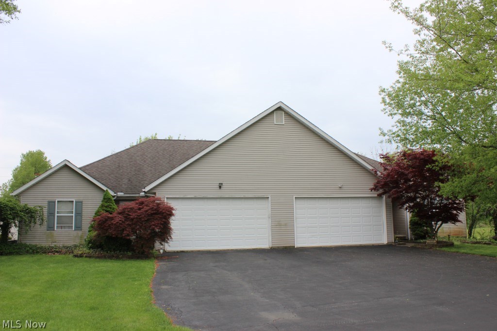 Phenomenal one owner two unit on quiet 1.09 acre circle drive* Each unit having approx. 2075SF, 2 bedrooms, 2 bath & laundry on 1st floor plus loft (possible 3rd bedroom), unfinished basement and 2 car attached garage, not to mention, a 28x40 detached garage with 12x14 workshop* 1st floor each unit having a vaulted great room/dining plus eat in kitchen, 1st floor master & bath plus guest bedroom & bath & laundry* 2nd level loft each unit (possible 3rd bedroom)* Full basement & 2 car garage (owners side)* Partial basement & 2 car garage (tenant side)* Sky lights* Shingles approx. 9 yrs.* A/C tenant side 2017* All electric* 40 gal hot water heater* Irrigation system* Tenant side rented for $925 since 2007* Detached garage (large enough for a motor home) has easement with access to Killian Road* Ideal for owner occupant* Truly a rare find!