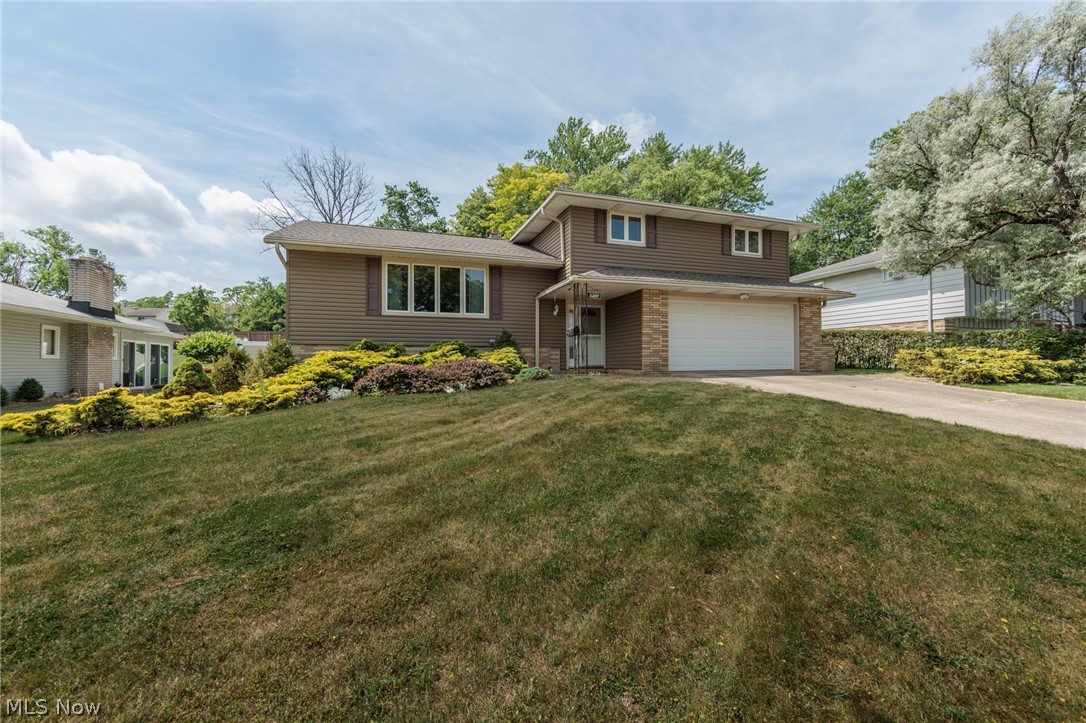 One owner split level home built in 1972. Well cared for and ready for new owners! Features & updates of this home include Anderson windows throughout, updated kitchen 2019, roof 2015, furnace 2024, electric panel 2026, upstairs bath 2024, siding 2015, leaf guard gutters, nature stone floors in garage & laundry room, glass block windows, water connection & drain in the garage, back yard has full vinyl fencing, a remote controlled awning over the deck and 2 storage sheds.
All appliances will remain including washer and dryer.

The living room has vaulted ceilings, fireplace and is attached to the dining room with a slider to the deck. A lower level family room is open to the kitchen and also leads to a spacious sunroom. There is a half bath off the family room. Upstairs you'll find 4 generous sized bedrooms, all with hardwood flooring and ceiling fans. The full bath has a double vanity and a newly installed walk-in shower. There is a basement in this wonderful home featuring the laundry room with built in shelving, a bonus room/workshop and a possible 5th bedroom complete with a closet. Lots of room grow in this awesome home. Come take a look!!
The deck needs work.
HOME BEING SOLD AS IS