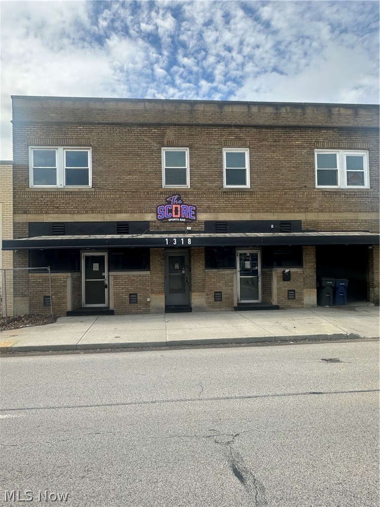 Fabulous opportunity for this mixed use property. Full.y functional and ready to operate kitchen that was formerly a bar. Lots of potential with a game room, space for a band and dance floor. Two (1 br) apartments (approx 740 sq ft) and Two efficiences (approx 660 sq ft)above the space. Full basement. 4 garage spaces plus driveway & street parking.