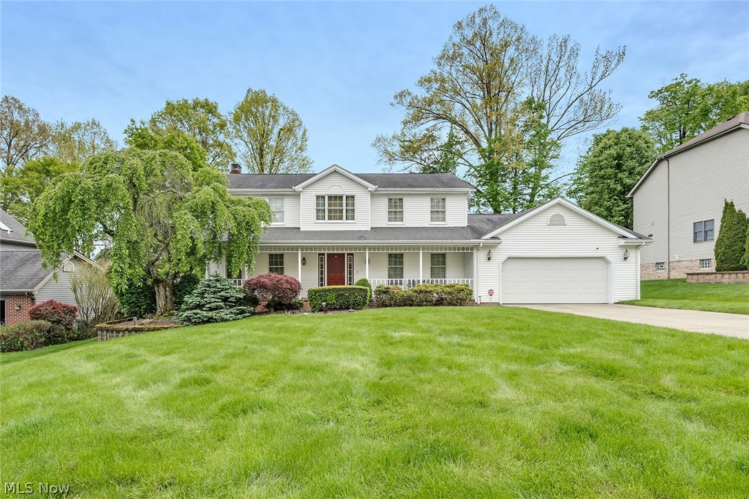 Welcome home to this beautiful property located in the Canfield School District! Offering a functional layout and thoughtful updates throughout, this home features a spacious kitchen with granite countertops that continue into all three bathrooms and the first-floor laundry room, creating a cohesive and elegant look.The inviting living area is highlighted by a cozy gas fireplace, while the glass door provide easy access to the backyard. Outside, enjoy summer days in the above-ground pool and relax on the charming back deck or front porch that adds both character and curb appeal. Additional living space can be found in the partially finished basement, perfect for a recreation room, home office, fitness area, or playroom. Convenient first-floor laundry and ample space for entertaining make this home as practical as it is appealing. This home is ready for its next owner to move in and enjoy.