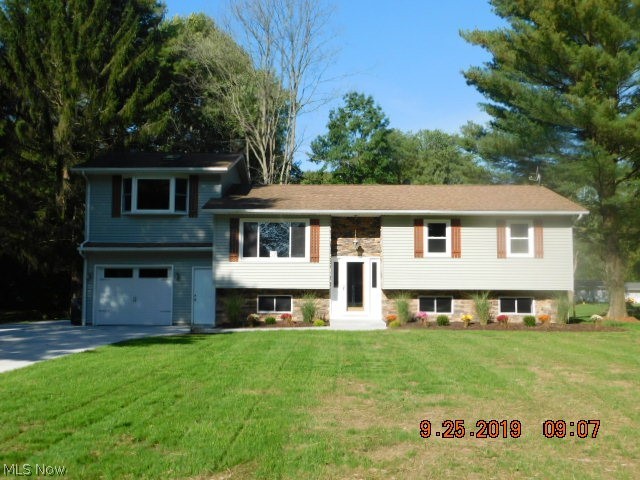 This 4 bedroom 2.5 bath Bi-Level home built in 1977 has been completely remodeled from top to bottom since 2017. Basement was water proofed, East wall of basement replaced, new hot water tank, updated electrical, new plumbing, new insulation, new downstairs windows, new counter tops and counters, and new dimplex baseboards through out home, for an efficiency. New drywall, paint and flooring throughout the home. Do not forget the new concrete driveway, walkways and back yard patio. Do not miss out on this beautiful home. Large .53 acre lot newly seeded grass. This home has it all plus great curb appeal all on a cul-de-sac feeling street that leads to the Grand River. Relax out on your back deck or patio and enjoy your morning coffee while you listening to your peace and quiet. This is a great home for entertaining family and friends. has a great country feel while living in a quaint neighborhood.