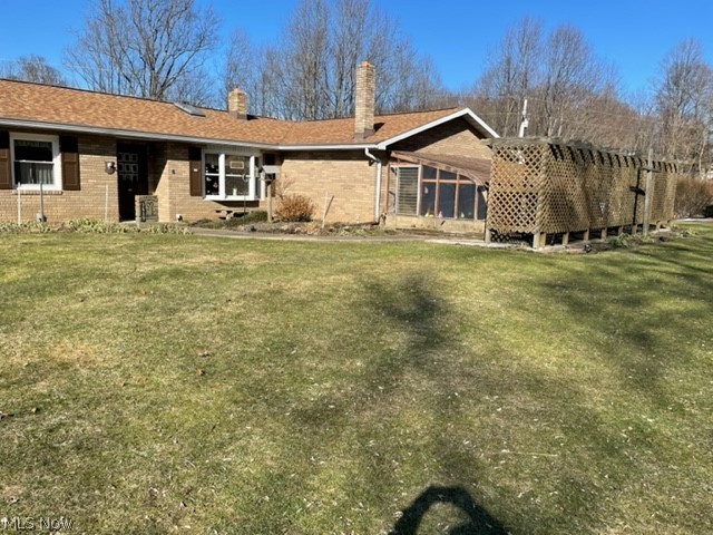 THIS WELL CARED FOR 4BR, 2BA BRICK RANCH FEATURES WHOLE HOUSE GENERATOR; FINISHED WALK-OUTBASEMENT WITH GARAGE AND DRIVEWAY; ENCORE FLOOR SEALER IN ATT. 2 CAR GARAGE; CORIAN KITCHEN COUNTERTOP, SINK; SKYLIGHTS FOR EXTRA SUNSHINE; MBR BALCONY; HAND-LAID PAVER
DRIVEWAYS; ATTACHED GREENHOUSE AND INGENIUS GARDEN WATERING SYSTEM; 2ND FLOOR OF18 x 26 BANK BARN OFFERS WORK SHOP AND STORAGE.