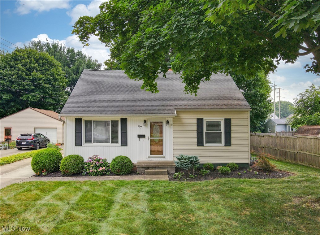 Welcome to this darling Cape Cod in the heart of Mogadore! This charming 3-bedroom, 2-bath home offers a warm and functional layout, including a spacious upstairs bedroom with an adjoining loft/bonus area, perfect for a home office, reading nook, or playroom. You’ll also love the added closet space on the second level for extra storage. 
The heart of the home is the beautifully remodeled kitchen (2023), featuring quartz countertops, soft-close dovetailed cabinetry, and sleek new appliances—blending style with modern convenience. Additional updates throughout the home include new flooring on the main level, fresh paint, updated light fixtures, and select new doors.
Step outside to enjoy the patio located off the dining room, a spacious backyard with a large paved driveway and an oversized 2-car detached garage—ideal for vehicles, hobbies, or extra storage. This lovingly updated home is move-in ready and the perfect place to call home!