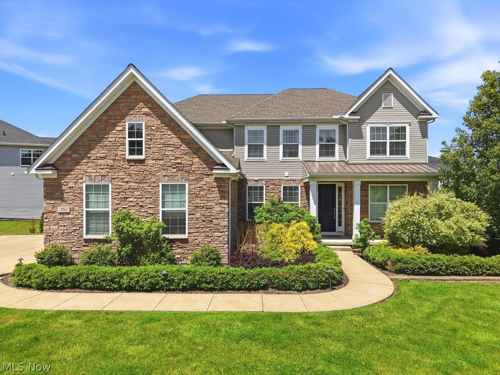 EXCEPTIONAL luxury home offering the perfect blend of comfort and elegance in the highly sought after golf course community of Aberdeen. This stunning 5 bedroom, 4.5 bath home truly has it all and more! Built in 2017, this meticulously maintained home features an open concept design with seamless flow and modern finishes throughout. The kitchen is a true showpiece, featuring a massive island with expansive counter space and abundant cabinetry. It is fully equipped with stainless steel appliances, a new Wolf cooktop paired with a modern vent hood, granite countertops, and a spacious walk in pantry, making it perfect for both everyday living and entertaining. The kitchen flows seamlessly into a dramatic two-story great room with a coffered ceiling and floor to ceiling stone fireplace. French doors open to a bright sitting room, while formal living and dining rooms provide elegant entertaining space. A half bath, mudroom and large closet complete the main level. The second floor includes a bedroom/in-law suite with ensuite bath, three additional generously sized bedrooms, and another full bath. The luxurious owner’s suite features a tray ceiling, a spa like bath with a freestanding soaking tub and custom tiled shower, and an extra large walk in closet. The finished lower level, completed in 2021, is nothing short of spectacular, featuring an expansive media room with surround sound and a fully equipped wet bar with refrigerator, wine fridge, and dishwasher, highlighted by an exquisite custom herringbone feature wall, creating the ultimate space for entertaining and relaxation. Additional highlights include a glass-enclosed home gym, possible sixth bedroom and gorgeous full bath with walk-in tiled shower. Outdoor living is enhanced by double sliders leading to a covered rear porch and a private side yard. Residents enjoy access to a pool, tennis courts, pickle-ball court, walking trails, exercise room, playground and StoneWater Golf.  Truly a must see spectacular home!