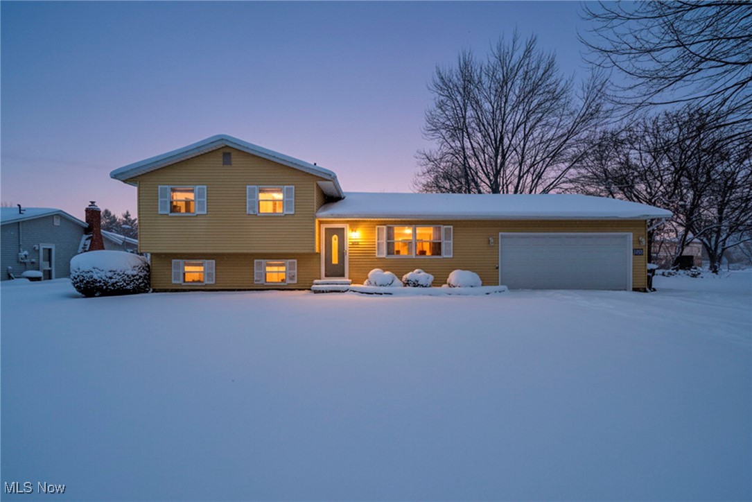 Experience the comfort and charm of true small-town living with this 3-bedroom, 2-bath split-level home set on just under an acre in the peaceful community of Columbia Station. Surrounded by open space and a serene setting, this property offers a lifestyle where you can slow down, spread out, and enjoy the simple pleasures of everyday life. Whether it’s quiet mornings, open skies, or evenings spent outdoors, this home provides a welcoming retreat from the pace of city living.

The home features a 2-car attached garage and a barn with a concrete floor, offering exceptional flexibility for storage, hobbies, workshop space, or future projects. Inside, the lower level is enhanced with brand-new carpet, creating a comfortable and inviting space ideal for a family room, recreation area, or home office.

The expansive lot allows plenty of room for outdoor entertaining, gardening, recreational activities, or simply enjoying the natural surroundings that make this area so desirable. Located in a close-knit community known for its rural charm and small-town feel, this property combines space, privacy, and functionality while still remaining within easy reach of nearby amenities, schools, and major routes. A wonderful opportunity for buyers seeking land, versatility, and the warmth of a quieter lifestyle. Call today to schedule your private showing.