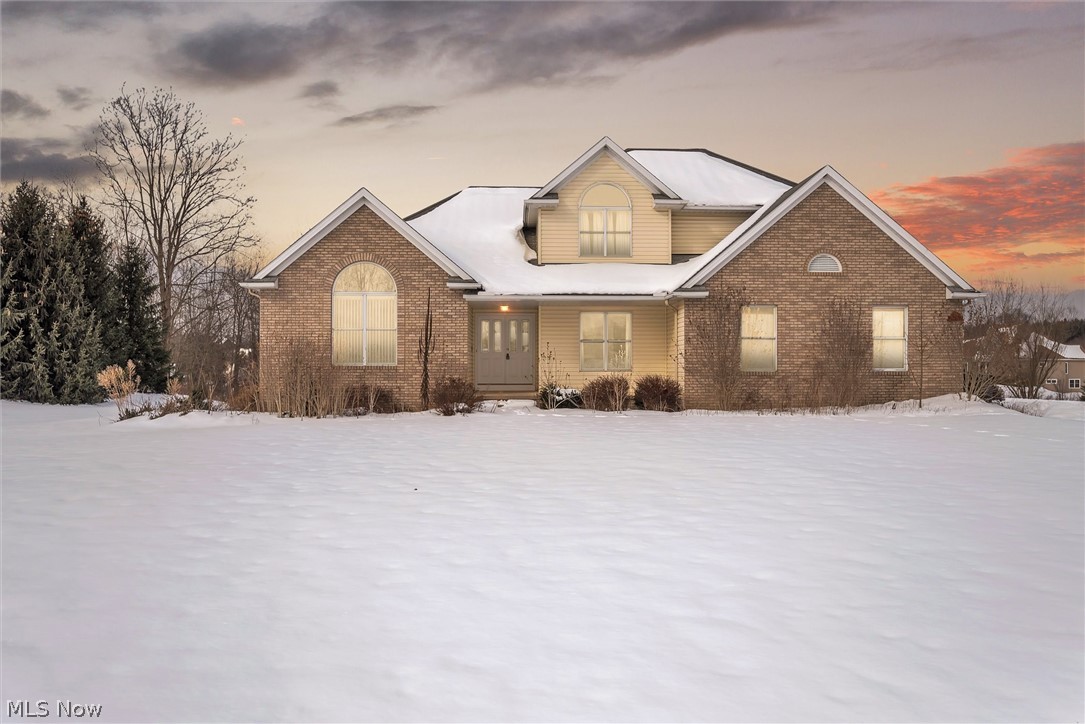 Custom built home with a first floor master and over an acre located in Valley City and a great location!  Just off the foyer is a office/den, formal dining room, and spacious great room with a cozy fireplace. The kitchen offers plenty of sun light , eat in kitchen, walk in pantry, and an island. The first floor owners suite has a large walk in closet and deluxe bathroom with shower and separate soaking tub. The laundry room and half bath complete the first floor of this home. The second floor offers 3 nicely sized bedrooms  and full bath. The walkout basement offers  beautiful nature stone floors is partially finished and also offers a full bath. Entertain your guests outside around the cozy firepit. Make your appointment today!