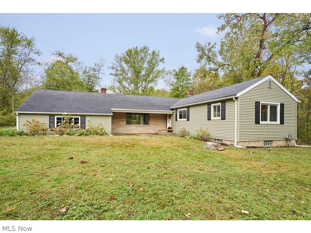 Welcome home to this spectacular Ranch located in Fairlawn and situated on 1.56 acres! This lovey home has so much to offer. As you enter, you will notice the well-maintained hardwood flooring throughout. Your extremely spacious living room awaits with a stunning fireplace and incredible built-ins. This is a great place to sit back, relax and unwind from your busy day! Just off the living space you will find a cozy den with another fireplace and beautiful  wormy chestnut walls. The kitchen is a must see! New countertops, subway tile backsplash, new flooring, stove/oven, dishwasher and new light fixtures throughout! The half bath conveniently sits just off the kitchen. Each bedroom is generously sized with large closets. Each bedroom comes with a cedar closet as well. Newer roof, siding, windows and furnace! The large basement offers plenty of space for extra storage. Your private property awaits as you walk out your back door. You will appreciate the refinished hardwood porch and so​​‌​​​​‌​‌​​​‌‌​​​‌‌‌​​‌​​‌‌​​​​ mu