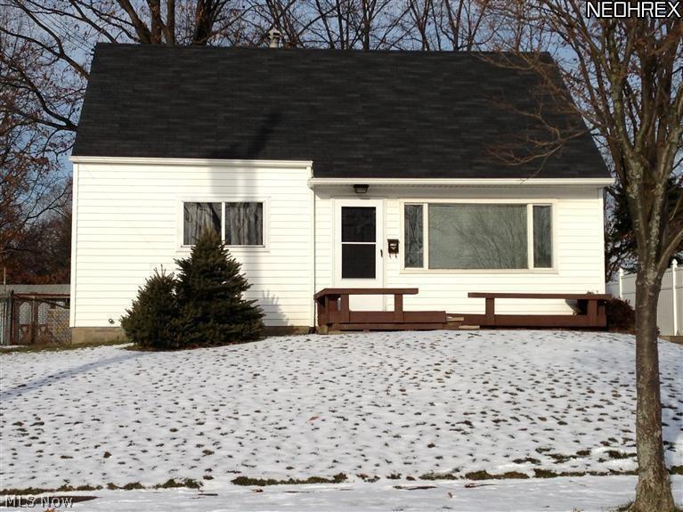 From top to bottom this house is ready for your family! Just move right in! The kitchen was completely remodeled in 2009. All appliances are included: dishwasher, oven/range, refrigerator. There is a half vaulted ceiling in kitchen & bathroom with a skylight. Bathroom was also completely remodeled in 2009. First floor laundry was added in 2009, with a stackable unit in a closet! House has newer carpet! Master bedroom has a new(2013) sliding door installed. There is a back patio with a nice roof to keep the weather off you while you enjoy the porch swing! Backyard is fenced in! House is a short distance from  neighborhood playground/park!