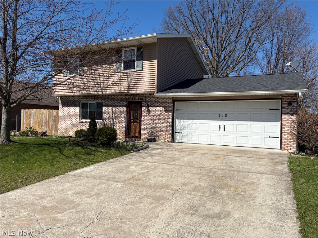 Very clean move-in ready home. Three bedrooms and 1.5 baths. Many updates including carpet in living room, stairs, landing & upstairs hall, wood floors in kitchen, dining & back/front door area, vinyl flooring in both baths in 2019-20. Front guest bedroom new carpet in 2025. Remodeled half bath in 2020. Remodeled full bath in 2025. New oak baseboards on first floor in 2020. New shingles in 2024. Most windows replaced in 2019. Added patio door in dining room 2019. New cement patio, walkway & pad behind garage in 2019. New pantry doors in kitchen in 2025. Hot water heater in 2023. Baseboard heaters in half bath & living room 2019. New baseboard heaters in upstairs full bath 2025.  Front door & storm door in 2019. Outside light fixtures front and back of the house in 2019. Electric outlets on the first floor replaced in 2020. Ceiling fan in kitchen in 2021. Dryer vent in 2019. Don't miss this one, schedule your showing today.