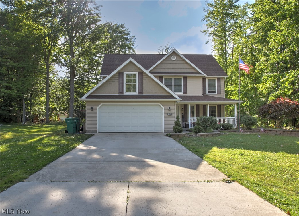 Welcome to this fantastic Colonial bursting with loads of charm and character around every corner.  A truly unique home in the highly desired Roaming Shores private lake community.  The inviting front porch greets you upon entering the spacious open design floor plan with vaulted ceiling foyer.  Enjoy entertaining intimate or large gatherings in the spacious open design kitchen and great room with a  gas fireplace that overlooks the full length concrete back patio and private backyard.  The large full length back patio is great for watching the sun set in the evenings.  In addition, the .52 acre LOT provides year round views and is great for backyard family picnics, camping and privacy.  The eat-in kitchen has updated cabinets and stainless steel appliances.  This lifestyle family friendly home offers 4 very large bedrooms with new laminate flooring, upstairs laundry room, 2.5 bathrooms, formal dining room, vinyl siding, 2 car garage, concrete driveway, leafguard gutters and a double LOT within walking distance  to Lake Roaming Rock.  The decor is neutral and the updates are outstanding.  The 550 acre private lake can be used for boating, water-skiing, tubing, fishing, kayaking and swimming.  This resort style community offers 2 swimming pools, a clubhouse, playground, tennis courts, pickleball courts, volleyball courts and a park with 10 acres of community land via walking path.  A Great Place to call home in the highly desired Jefferson Area School System!!
