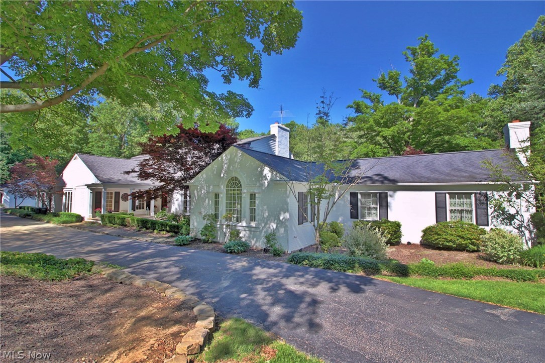 Gracious English Country home in the quaint Village of Gates Mills! This home has it all from the high quality finishes and superb detailing to the peaceful location and beautiful setting. Exquisite landscaped 4.5 acre lot with a stone terrace overlooking the private backyard. Stunning first floor master wing with a private Brazilian Cherry wood office, sitting room, his & her walk-in closets, luxurious master bath, and doors leading to a private patio. Stunning Chef's kitchen with professional appliances including Gaggenau, Subzero, and Wolf. A lovely vaulted sitting room, elegant living room, and formal dining room. 2 car attached plus garage plus a 2 car detached garage. So much more! Desirable location with plenty of privacy. Close proximity to main roads, I-271, Hillcrest Hospital, upscale shopping, and fine dining! A few of the most prestigious private schools in Cleveland are located just minutes away- Gilmour Academy, Hawken, & University School. The village of Gates Mills is o