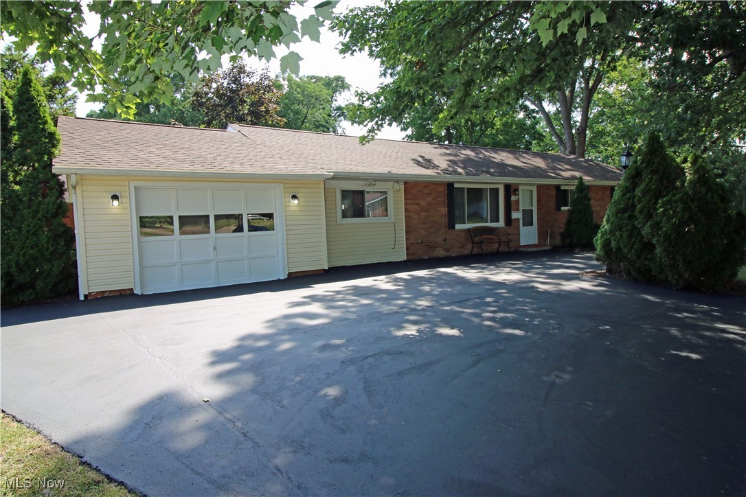 Looking for one level living? This brick ranch offers everything on one floor. Entering the front door you will see a spacious living room with carpet flooring. To the left of the living room is a family room with carpet. Off the family room is the first-floor laundry room complete with washer and dryer. The kitchen with vinyl flooring boasts a stainless-steel gas range (6/25), a stainless-steel built-in dishwasher and a stainless-steel refrigerator. There is also a walk-in pantry in the kitchen. There are 3 bedrooms, one of which has a private full bath off the bedroom. There is a guest bathroom in the hallway.  Ceiling fans in all bedrooms, living room, dining room and family room. Vinyl windows. The backyard has a generous sized deck and a wood privacy fence with 2 gates. There is ample parking in the oversized driveway. A nice sized side yard adds to the lawn space at this home. The roof is asphalt/fiberglass dimensional shingles. The owners are offering a home warranty with the home. Close to many of the city amenities, shopping and dining.