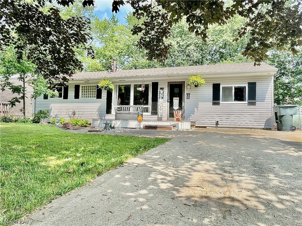 This adorable, nicely "cared for" ranch in Wadsworth may be your next home, but you better hurry!  4 bedrooms and 2 full baths at this price is a rarity! Not to mention that it also has a fully fenced in back yard!  Beautiful wood floors and a large family room that leads out to the inviting patio.  Let your furry family members run in the fully fenced yard!  3 bedrooms on one side of the house, with the main suite with dual closets, and decorated in a rustic theme is on the other side of the house.  2023, the sellers added new gravel and landscaping. In 2022 a new stove and microwave was added. New The roof, furnace and duct work were all replaced in 2018.  A new sump pump was installed in 2020. New siding was installed in 2021!  Sellers are offering a Home Warranty as well to give the new buyers piece of mind!