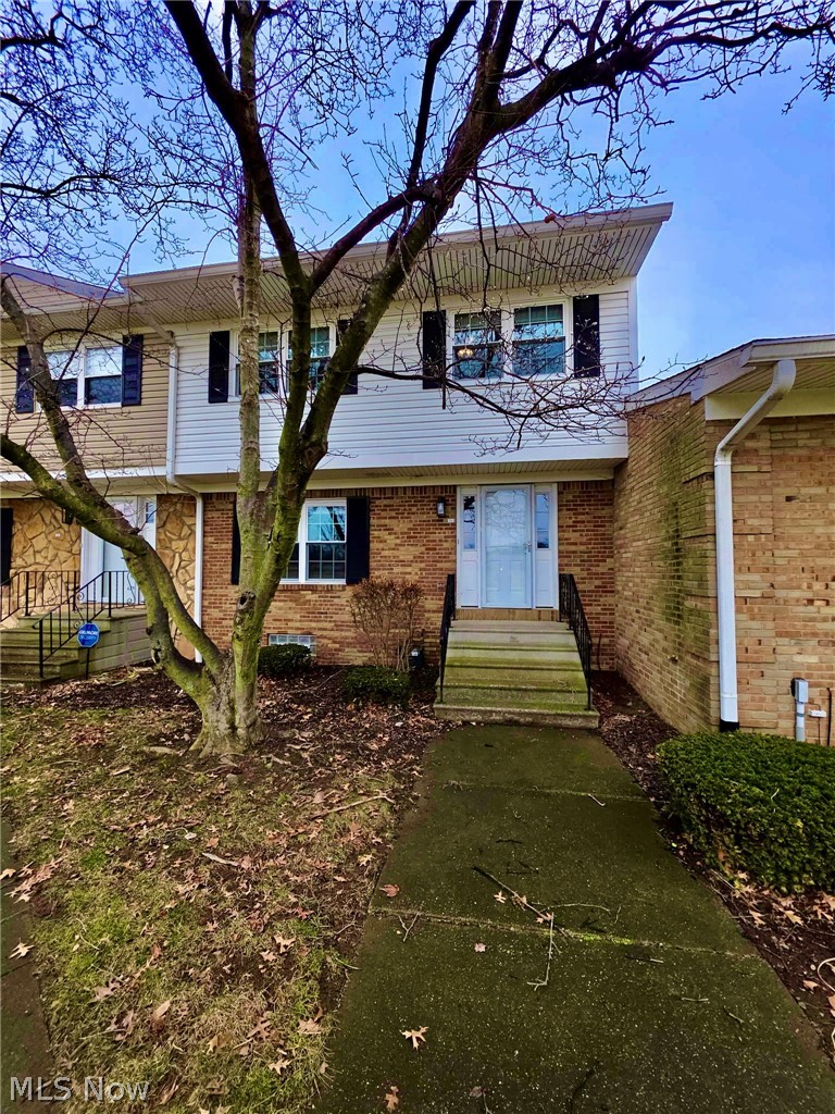 Completely remodeled, move-in ready condominium in the heart of Green offers maintenance-free living, with golf course view.  Close to shopping, restaurants, and walking paths, and easy access to highway 77.  Enjoy the clubhouse with game room and workout facilities as well as the pool.  Private patio area and two-car garage along with a full basement (partially finished) for added storage.  Please see the full list of improvements that makes this home unique and enjoy care-free living as the warm weather returns!