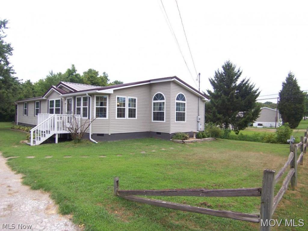 Move in ready. Beautiful level, tree lined property.  Covered deck off master.  Even another for grilling.  Open floor plan.  All appliances remain.  Newer wincore windows, metal roof, carpeting, and freshly painted.  Double stall garage with openers  Elem: Mineral Wells Elementary Schoo  Elem/Bus: Y  JrHigh: Edison Jr. High School  JrHigh/Bus: Y  High: Parkersburg South High  High/Bus: Y  Fire: VOL  Police: SHF  ;SQFT=Fin Above:1636, Fin Total:1636, Unfin Above:0;GAR= 2 Car Det, Opener(s)