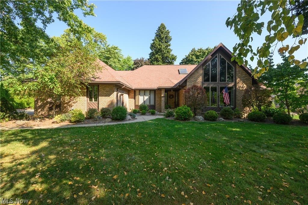 Move in ready! Custom built 3 bedroom, 2 1/2 bath contemporary home in Austin Estates on a cul-de-sac. 1st Floor features a great room with gas fireplace, skylights, wet bar and access to the patio and private backyard. Large eat-in kitchen with lots of cabinets, bayed window eating area. Formal dining room with black walnut floor milled from O.C. Barber's trees. 1st floor master suite with large walk-in closet; master bath with double sink vanity, stand alone shower, whirlpool tub and water closet. 1st Floor laundry. Living room with vaulted ceiling. 2nd Floor offers 2 more nice sized bedrooms and a full, freshly painted, bath with skylight and a loft. Full unfinished basement - perfect for storage or to finish for additional living space. 3 Car attached garage, freshly painted, with nature stone floor. Enjoy the seasons on the screened in porch.