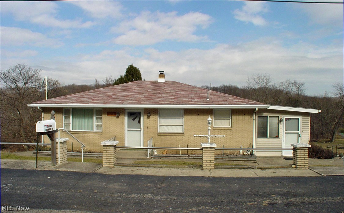 Beautiful park-like setting just minutes from amenities.  On over an acre this 1480 sq. ft. ranch.  Large 3 season room off of a huge rec room. Newer furnace, air conditioning and roof.  City and well water.  Workshop plus tons of storage space.