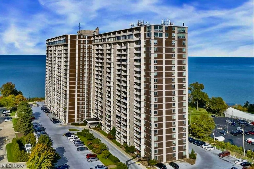 Rare opportunity to own a completely renovated Penthouse unit in the highly sought after Carlyle building located along Lakewood's "Gold Coast." PH#34 is a 4-bedroom, 2.5-bath, two-story condo offering NE views of Downtown Cleveland, Lake Erie and the surrounding neighborhoods - your own private retreat in the sky! The galley style kitchen includes granite counters, breakfast bar, stainless steel appliances, and new light/faucet fixtures. The half bathroom on main floor includes vanity with granite counters. The Carlyle has front desk and security, hotel-like lobby, conference room, party/game room, personal laundromat, in building deli market, hair salon and indoor and outdoor pools. Year round views and access to Pier W and Summer Place restaurants within minutes!  Come experience all the Carlyle has to offer! Schedule your showing today!
