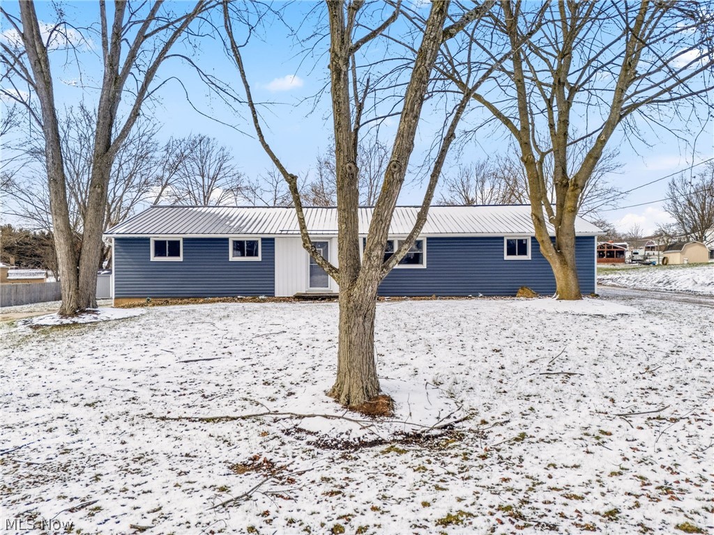 Move in ready ranch in Tuslaw Schools!! Beautifully renovated with a new roof, new siding, waterproofed basement, new lighting and more!! This ranch offers three bedrooms and two bathrooms with a large finished rec room and a walk up from the basement to the garage. In the back you’ll find a two car garage with additional parking space for a camper, rv or work truck. Enjoy the amenities of Meadowlake estates and relax at the pond this summer!! Tour today!!