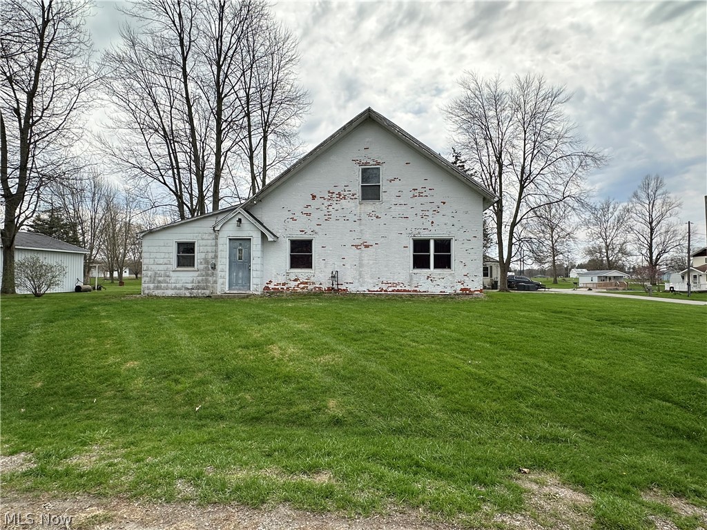 5-Bedroom Home on 1.4 Acres in Rural Attica, Ohio Motivated Seller!!
Discover peaceful country living in this spacious 1,943 sq ft home situated on three generous parcels totaling 1.4 acres. Offering 5 bedrooms—including 2 conveniently located on the main floor—this property provides exceptional flexibility for guests, multigenerational living, or home office needs.

A large kitchen serves as the heart of the home, complemented by a separate dining room and a warm, inviting living room featuring hardwood floors hidden beneath the carpet. The second level showcases beautiful hardwood floors throughout. Thermo-Pane windows are set in double thick brick walls. A dry basement adds even more storage and potential workspace.

The property includes a newer detached 2-stall garage complete with a workbench and built-in shelving—perfect for hobbyists or extra storage.

With its metal roof, spacious layout, and quiet rural setting, this home delivers comfort, practicality, and room to grow—all just minutes from town conveniences.