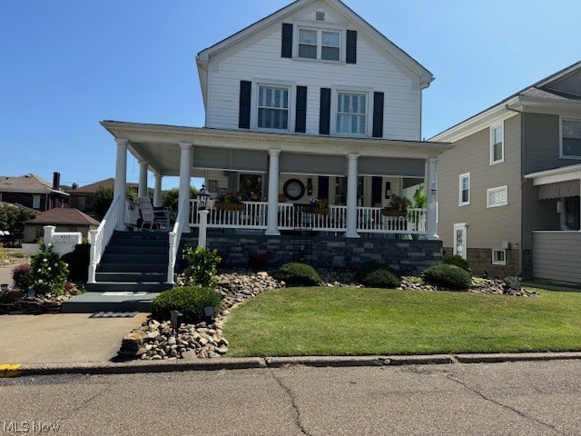 This stunning 3-story, 4 BR, 2 bath home, renovated from top to bottom and in pristine condition. Every detail has been thoughtfully redesigned with high-end finishes and quality craftmanship, creating a perfect blend of modern comfort and timeless style. The spacious living area features a cozy gas fireplace, offering a warm and inviting atmosphere for relaxing or entertaining. Kitchen and baths showcase premium upgrades, while generously sized bedrooms provide comfort and flexibility. Step outside to enjoy the outdoor living space with a wraparound porch, and gazebo equipped with its own fireplace and TV. Ideal location offers convenience, luxury and lifestyle all in one! Truly turnkey!