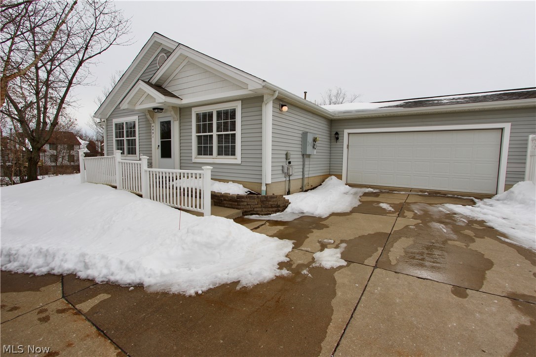 Hurry.....Hurry......Hurry. This low maintenance, lovely ranch home offers 2 bedrooms,  2 full baths and is move-in ready. The spacious living room with vaulted ceilings is complete with a three-sided gas fireplace to enjoy from many directions. Newer flooring(2018)has been completed for you through most of the home. The kitchen opens to the dinette area which leads out to the back patio.  The “sun/flex” room provides a vaulted ceiling with a new sky light, ceiling fan and two walls of windows, that provide plenty of natural light. The master suite with vaulted ceilings provides a comfortable retreat complete with a walk-in closet, walk-in shower and a soaking tub. A second large bedroom is also a great option for an office.  The laundry room sits off the garage entry and there is abundant closet space throughout the home.  This lovely home is also a short distance to the clubhouse and pool. New roof and skylight (2020).