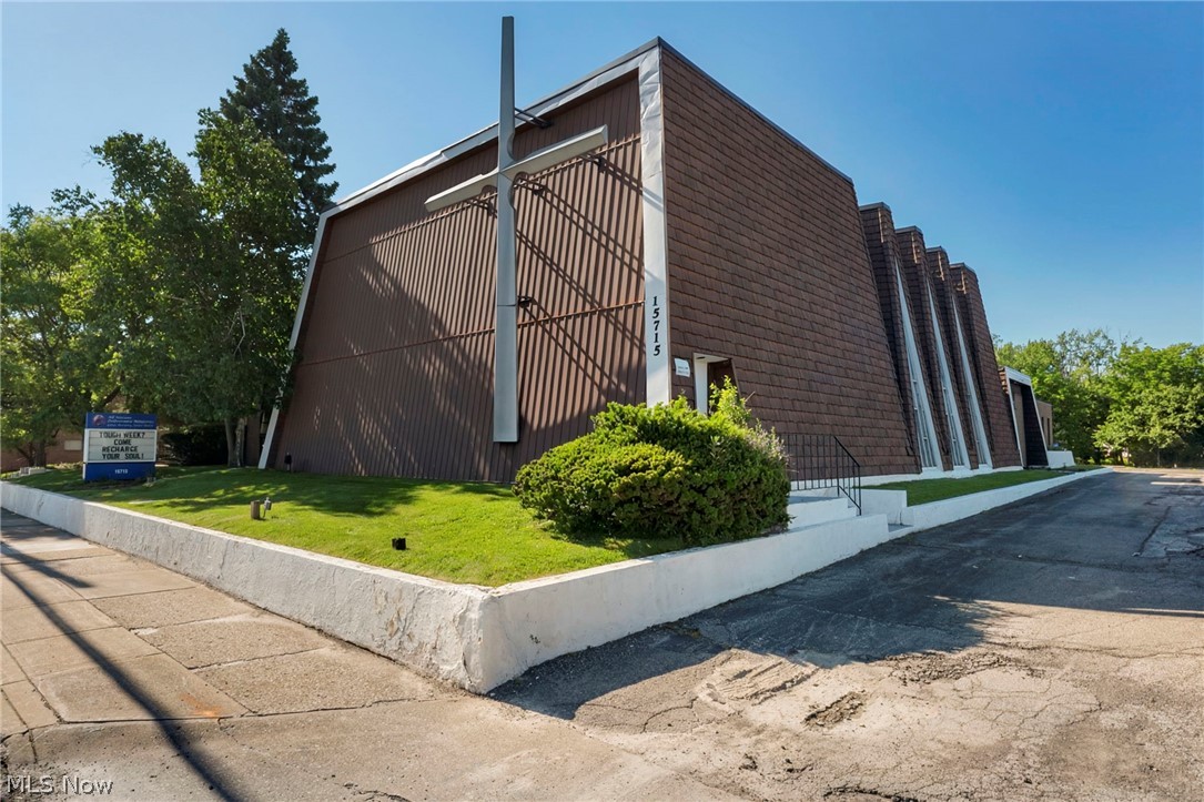 14,042 SF multi-building campus situated on 1.89 acres with 60+ parking spaces in Maple Heights’ Central Business District. Currently operating as an active church, the property consists of two connected buildings linked by an enclosed breezeway. The newer sanctuary, built in 1962, features seating for approximately 300, stained glass windows, tall ceilings, two offices, and restrooms. The original church, built in 1920, currently serves as a multi-purpose/event space and includes a full kitchen, open gathering area, classrooms, storage, and a finished basement. Retail zoning allows for a variety of potential uses including continued religious use, school, daycare, event venue, nonprofit, office conversion, community center, or mixed-use facility. Located along Libby Road near Maple Heights Library with convenient access to major highways, surrounding suburbs, retail, and residential neighborhoods. Ample parking, flexible layout, and multiple gathering spaces create a unique opportunity for owner-users, nonprofits, educational operators, and community organizations. Opportunities like this are rare and this won't last long!