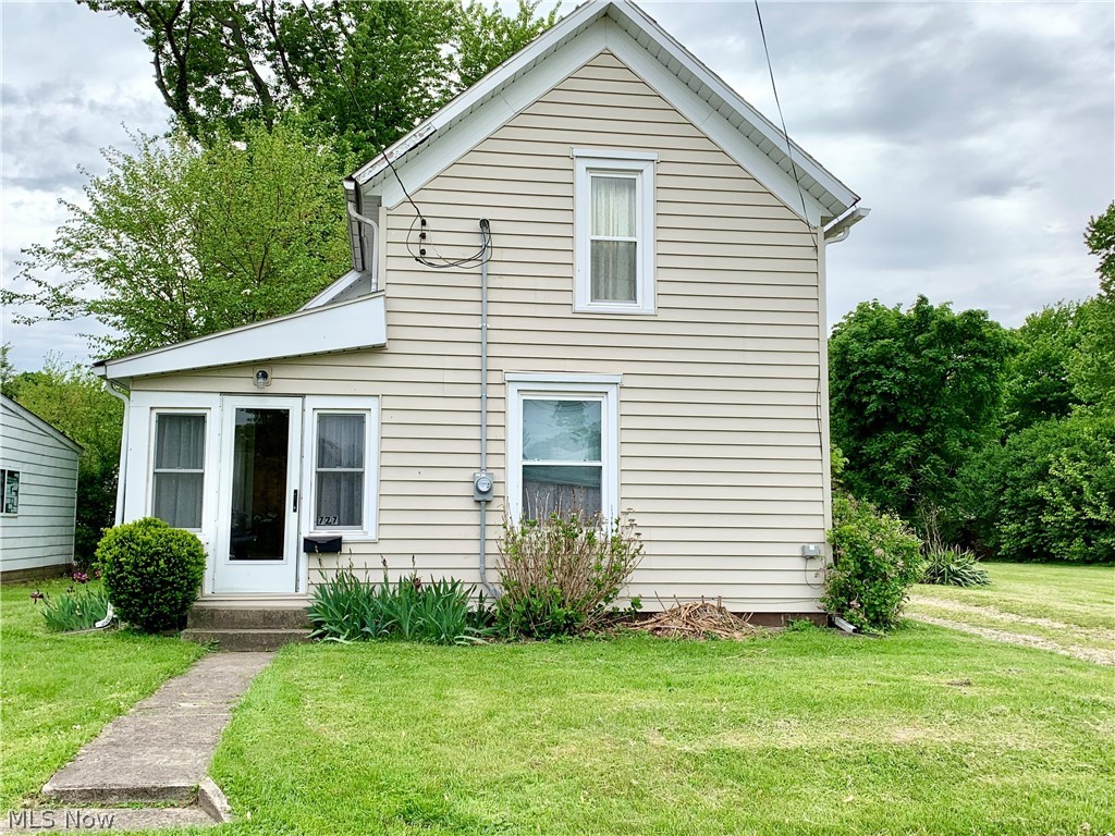 Looking for a property close to Lake Erie to park a boat and enjoy the lake or a family looking for a four bedroom home in a great neighborhood then your search is complete. Bring your paint brush and make this property your own. The home has had new carpet replaced on the first floor within the last year and a new roof was put on 4-20-2022. Newer replacement windows, vinyl siding, and furnace are the most recent updates. The home has first floor laundry, full bath, and bedroom. The second floor has three bedrooms and a full bath. The home sets on a double lot that would be very easy to add a garage or storage building to, if desired.