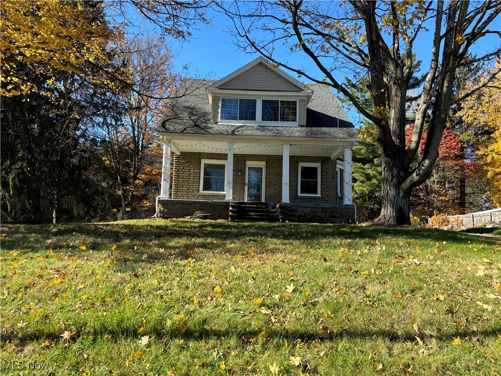 Enjoy the country setting in this two story century home. 2.5 acres in Mantua Township yet only a few miles to entertainment, shopping, and dining. Beautiful woodwork throughout so much of the home and built ins in the parlor.  Remodeled kitchen with a breakfast bar and stainless appliances. The sunroom flows out to a deck that overlooks your above ground pool. Private sun porch off of the master bedroom makes for a great library or office. 4 car garage. Windows on first floor March 2025, Furnace 2023