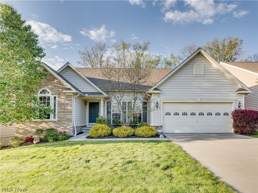 This impressive Ranch style home is situated in the desirable Hidden lakes community of Peninsula with Hudson schools and Falls utilities! The floor plan plus décor is open, light and bright with cathedral ceilings and multiple windows across the back on both levels welcoming the sunlight! Beautiful hardwood floors from foyer to kitchen to dining room. Very spacious Great Room with full wall stone fireplace. Beautiful cherry kitchen cabinets plus stainless appliances. Fabulous dining area with cathedral ceiling steps out to deck porch.  The Master suite includes a lighted tray ceiling and private bathroom with dual sinks and dual closets. First floor also includes two more bedrooms, guest bathroom, laundry and French doors into the office. You'll love the finished lower level, it's very spacious, light and open. It includes the huge rec room, full bath, storage area and a walkout to the brick patio overlooking a private wooded area. Don't hesitate, call today!