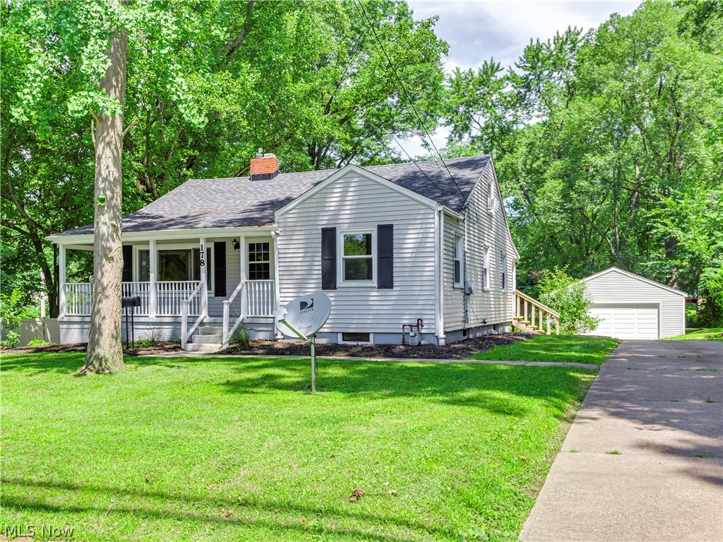 Just move in and enjoy!  Many updates on this 3-4 bedroom cape cod.  Enjoy the front porch on these beautiful summer nights, newer carpeting, Large Kitchen with new flooring, newer counter tops, farm style sink, 2018 disposal, new convention oven 2019, refrigerator 2018, and updated dishwasher.  Updated bathroom and carpet throughout.  New 2 car garage in 2019 with concrete floor.  Also 1 car attached garage.  Basement has a new utility sink, washer and dryer 2017, furnace and air 2018, main breaker replacement 2017, electrical outlets in basement and outside 2017-18.  2017 drainage system in the back of the attached garage.  Concrete patio in the back 2017, gutter guards 2017 and front steps 2018.  The bonus room can be used as an office or additional bedroom and there is extra unfinished storage area on the 2nd floor.