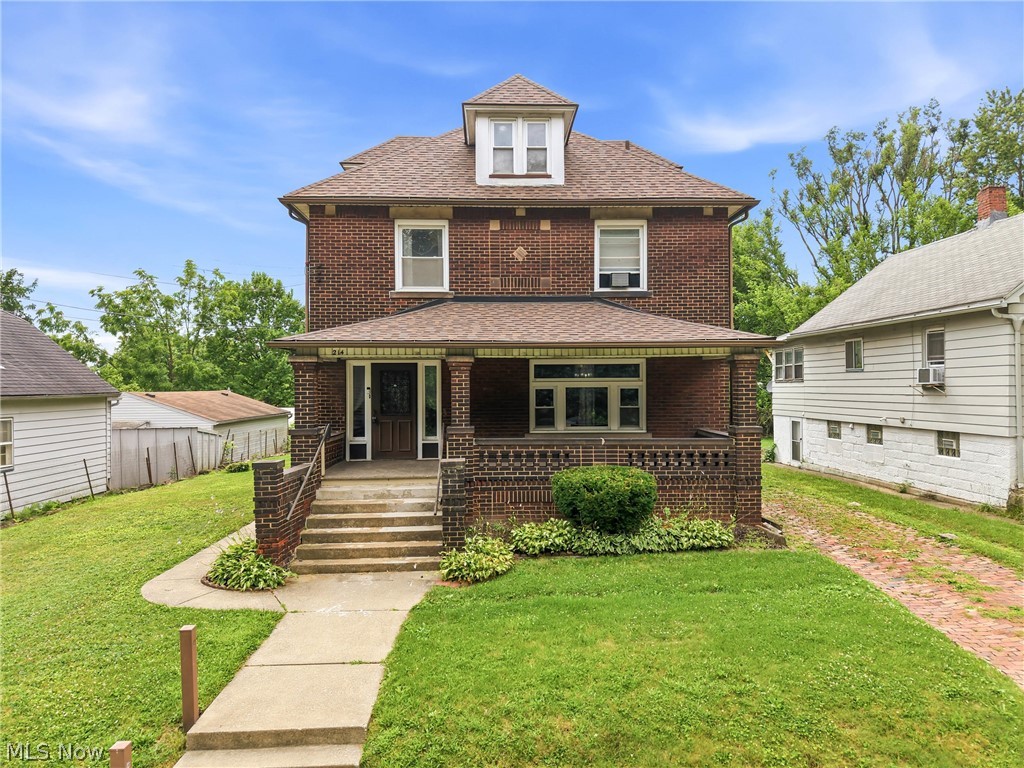 Welcome home to this charming brick two story home in the Campbell School District offering four bedrooms, two full bathrooms, and timeless character throughout. A massive covered front porch welcomes you into a spacious foyer with access to both the living room and kitchen. The large living room features beautiful hardwood flooring, original woodwork and character, a ceiling fan, and French doors that open into the formal dining room. The dining room continues the hardwood flooring and provides an inviting space for family dinners and entertaining. The spacious kitchen offers solid wood cabinetry, laminate countertops, a dedicated dining area, and a tucked-away sink with additional cabinet space. Just off the kitchen is an enclosed mudroom that provides convenient access to the backyard and detached two car garage. Upstairs you'll find four generously sized bedrooms, 2 rooms with hardwood flooring and 2 with carpet. Two bedrooms offer ample closet space, while the remaining bedrooms provide flexibility for family, guests, or a home office. The full bathroom has been updated with vinyl plank flooring, a tiled tub surround, and a newer vanity. An unfinished attic provides plenty of additional storage space. The basement offers abundant storage, a laundry area, and a second full bathroom complete with a walk-in shower, vanity, and toilet. Additional improvements include a newer furnace, 100 amp electrical service, newer dimensional shingle roof, vinyl replacement windows, and glass block basement windows. With its solid brick construction, spacious floor plan, classic charm, and endless potential, this Campbell home is ready for its next owner to make it their own.
