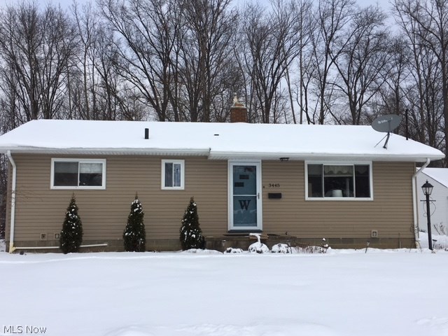 Amazing space in Mogadore!  This 3 bedroom ranch offers all you need and more.  With 2 full bathrooms, living room, eat-in kitchen, huge open living area, family room and 4th bedroom in the basement.  When you walk in the front door you will love the beautiful original hardwood floors.  The living room opens into the kitchen with all appliances included.  Down the hall you will find 3 bedrooms, all with hardwood floors and the main floor bathroom.  New Bath Fitter surround (with lifetime warranty), linen closet, newer vinyl flooring, updated lighting and new toilet.  But that's not all..  The lower level has so much space with 5 extra rooms and a full bathroom!  Bathroom has a new toilet, nice vanity and shower.  There are glass block windows, 2 year old hot water tank, 7 year old furnace, sump pump and so much storage.  New roof and siding 2007, updated windows, blown in insulation 5 years ago, new storm door and ceiling fans throughout.  You can't forget the huge 24x30 2.5 car garage