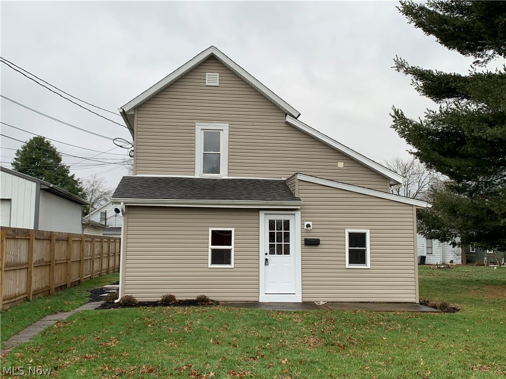 Beautifully remodeled home in move-in ready condition for under $100k! This home has 3 bedrooms, 2 full baths, a first floor laundry room and it sits on a 34x134 lot. There is a first floor master bedroom with a private bath and a walk in closet. The kitchen is equipped with a stove and refrigerator. Upstairs are the 2 additional bedrooms and the second full bath. Updates include vinyl siding, thermopane replacement windows, a new central air unit, new 100 amp electric, all new flooring and paint and so much more. The hot water tank is a rental. Immediate possession is available.