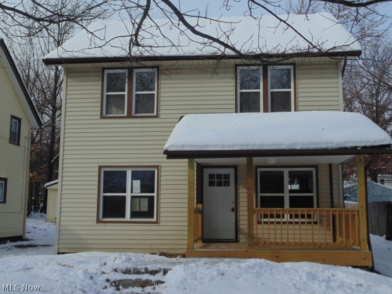 Violation Free front porch Colonial. Totally updated! New plumbing, electrical, a/c, windows, doors, hardware on doors, light fixtures, garage roof, front porch. Gorgeous  Kitchen with 42" cabinets, glistening hardwood floors throughout. Lower Level waterproofed & will be carpeted! A MUST SEE! Taxes include $80.80 in assessments.