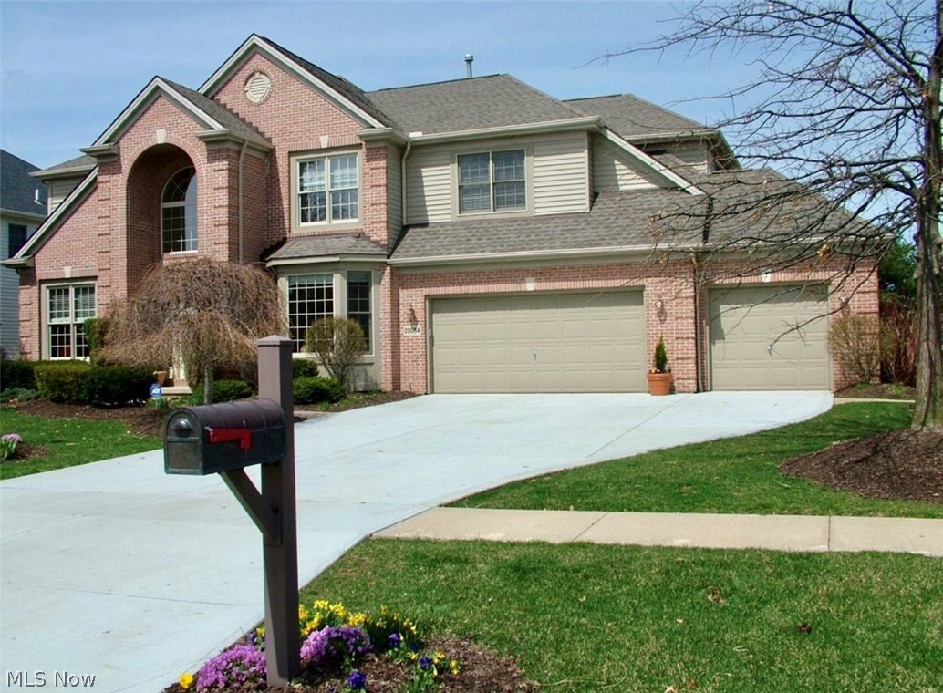 Beautifully appointed brick front Colonial nestled in Waterford Crossing. Grand foyer w/ a gorgeous chandelier, gleaming hardwoods & open staircase w/ wrought iron spindles. French doors open to the private office & a den/dining room w/ bay window is found across the way. The stunning eat-in kitchen features a lovely backsplash, breakfast bar, ample cabinetry, pristine granite counters, stainless appliances, planning desk & dining area. The kitchen also offers great conversation into the family room, so you’ll never miss a minute w/ your guests. The soaring two story family rm has a cozy fireplace, plush carpeting (2015) & a wall of windows for a significant amount of natural light. First floor also contains a 1/2 bath, laundry room & access to the 3 car garage. Retreat upstairs to the vaulted master suite w/  WIC, a sitting nook & master bath (2013) w/ a massive walk-in shower w/ 2 shower heads, Jetted tub for winding down & convenient double vanities. The second level also highlights