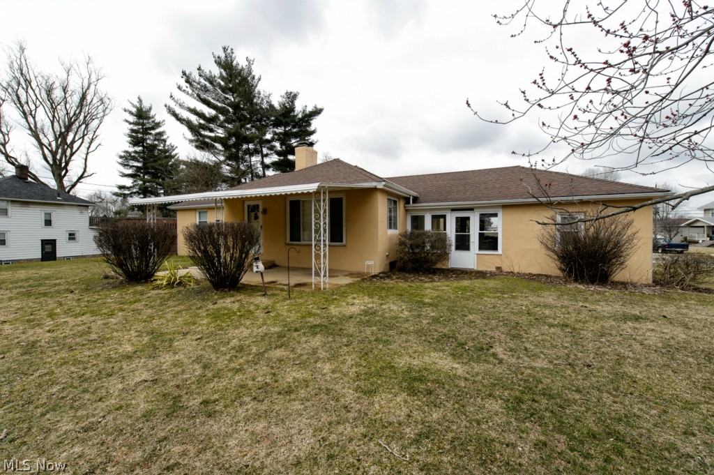 What a great ranch home! It's so much larger than it appears. An addition of a vaulted family room on the back of the home makes all the difference. Plus, it's located on a corner lot with just under 3/4 acre. The front living room is elegant and offers gorgeous hardwood flooring that runs throughout the home and a fireplace with built in shelves. Off the living room are French doors leading to the breezeway. The eat in kitchen provides lots of cabinet space, all appliances, and ceramic tile flooring. It overlooks the family room addition which has a bar area and two patio doors that lead outside.  The master bedroom plus two additional good sized bedrooms share the updated full bath.  A full unfinished basement includes shelving for storage and a ventless gas heater.  There's also a breezeway off the kitchen which makes a great mudroom or additional place to relax. Outside, choose to sit on the patio with knee wall and enjoy the large level back yard with mature fruit trees.  A shed i