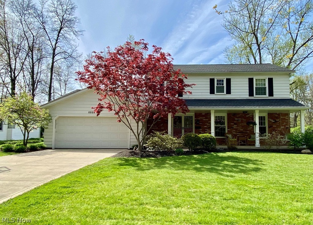 Updated colonial with charming front porch with porch swing. Open floor plan with newer wood floors throughout the first floor (2019). Spacious living room with gas fireplace and formal dining room. Kitchen with eating area updated in 2020 with soft close shaker style cabinets, granite countertop, tile backsplash and stainless appliances. Family room with French doors to the stamped concrete patio and fully fenced in backyard. Master bedroom with updated full bath on second floor (2018) with three additional bedrooms and updated hall bath. Great storage, first floor laundry with built -ins, and other updates include: driveway ’16, storage shed ’14, roof/gutters ’11, High efficiency furnace ’10, stamped concrete patio ’07, windows ’06. Great location on a beautiful street.