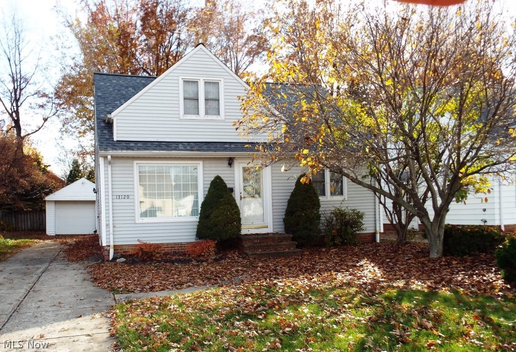 Nice 3-bedroom bungalow with huge master bedroom upstairs. Updates include:  White kitchen with all appliances; siding; central air; new roof; glass block windows; fenced yard; security system and more! Priced to sell!