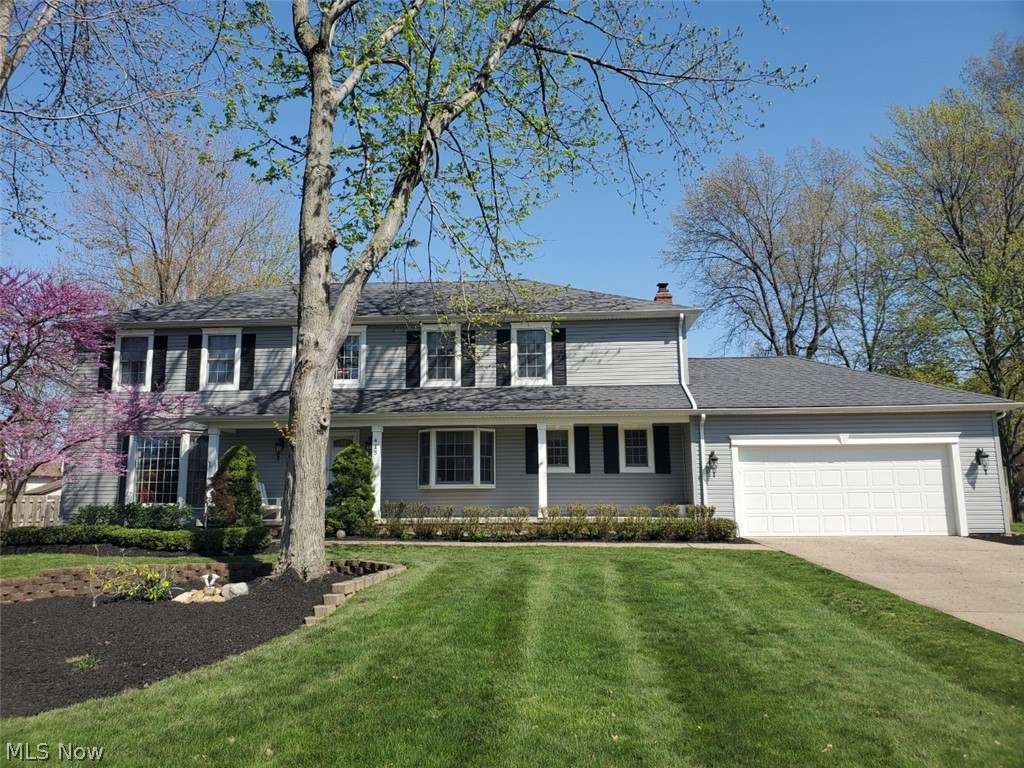 Highland Woods Updated Traditional Colonial. Are you ready to party? This meticulously maintained home includes 4 bedrooms, 3.5 baths, finished rec. room and first floor office. The updated gourmet kitchen includes granite countertops, hardwood floors, top of the line stainless steel appliances, cooktop and built in wall oven. The family room includes raised hearth brick gas fireplace and wet bar. The family room leads to an amazing sun room with wood ceiling. The backyard feels like your at a vacation resort. The sun room leads to a  composite deck which over looks an amazing inground pool. The backyard is totally fenced in and includes a storage shed for additional storage. The updated huge master suite includes a vaulted ceiling  and ceiling fan. The glamour bath includes an arched window, jacuzzi, and incredible walk in closet. The master bath includes electric radiant heat under new ceramic floors. The vinyl siding, gutters. roof and mechanicals have been replaced and are not original. The home has a tankless water heater so you never run out of hot water! The dry basement has a huge rec. room, large office and full bath...The luscious lawn has a working sprinkler system. A great space for entertaining or family gatherings. The pride of home ownership is evident in this house.  The seller is offering a home warranty with the property. The home was built in 1988 by prestigious 3M builders. Enjoy !