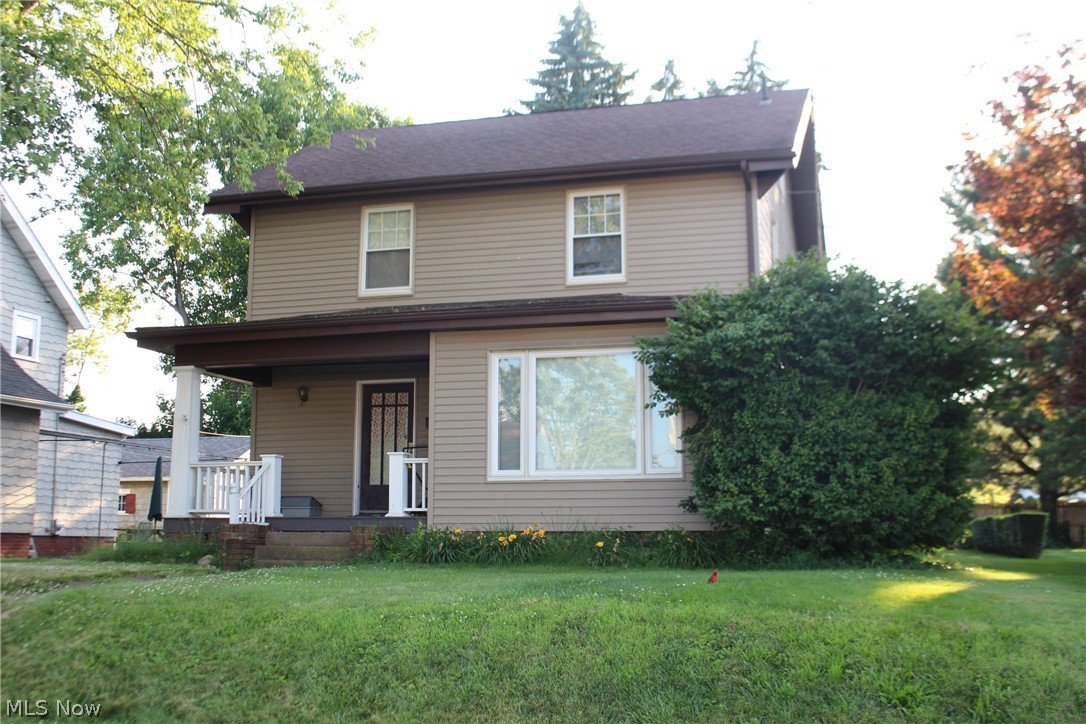 Great 3 bedroom (finished walk-up attic could make a nice 4th bedroom), 2 full bath home with finished lower level.  The main level has a spacious hardwood floored formal living room with built-in shelving, crown molding and fireplace;  Hardwood floored formal dining room with chair rails, crown molding and an arched doorway; Large, beautiful kitchen with tile flooring, a pantry, cherry cabinets, and slider to the back deck. The 2nd level has 3 bedrooms and a large full bath with a  double sink vanity,  tile flooring and built ins.  Lower level offers a finished rec room with tile flooring, a full bath, storage room and a bonus room. Covered front porch, wood deck in the back and detached 2 car garage.  Carpet Professionally cleaned, front porch and rails freshly painted.  This lovely home has everything you would ever want, hurry up!  be the first one to get in !