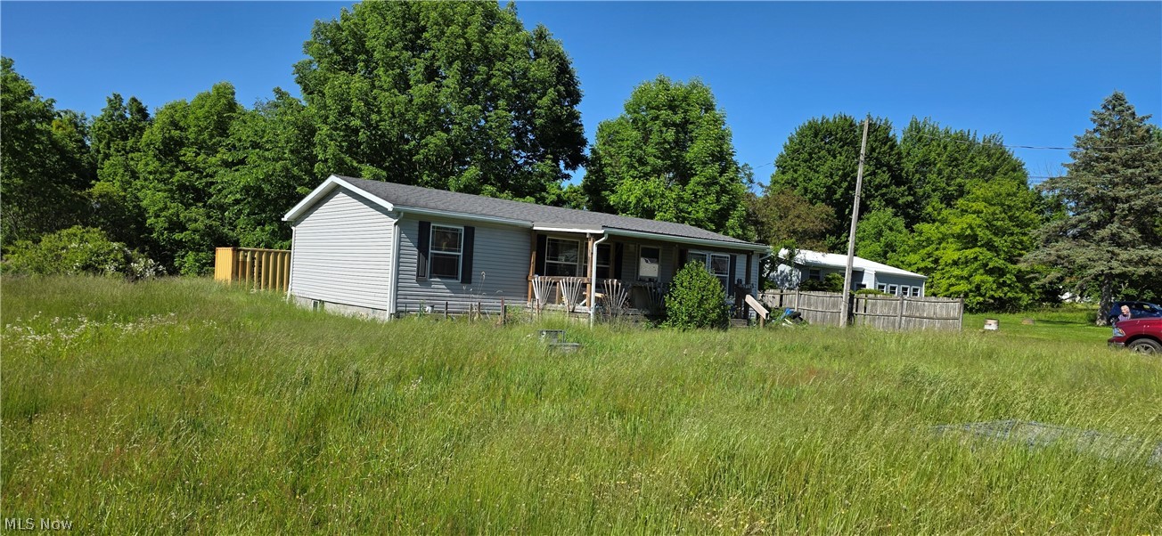 Looking for an affordable home in a prime location? Enjoy the convenience of one-floor living just a short distance from Mosquito Lake and close to shopping, dining, and everyday amenities.

One of the newer homes in the area, this property offers the peace of mind that comes with modern plumbing and electrical systems built to current standards. A large backyard, it combines comfort, functionality, and value.

Inside, you'll find a highly efficient floor plan with vaulted ceilings that create an open and spacious feel. The kitchen and bathroom are in great condition, while newer mechanical systems, roof, and windows help minimize future maintenance concerns. A dedicated laundry area with all hookups already in place is conveniently located adjacent to the kitchen.

While the home does not have a garage, it includes an extra-large metal storage building/shipping container, providing ample space for tools, equipment, and additional storage needs.

The home could benefit from new carpeting and general cleanup, and is priced accordingly, making it an excellent opportunity for buyers looking to add value while enjoying a desirable location.