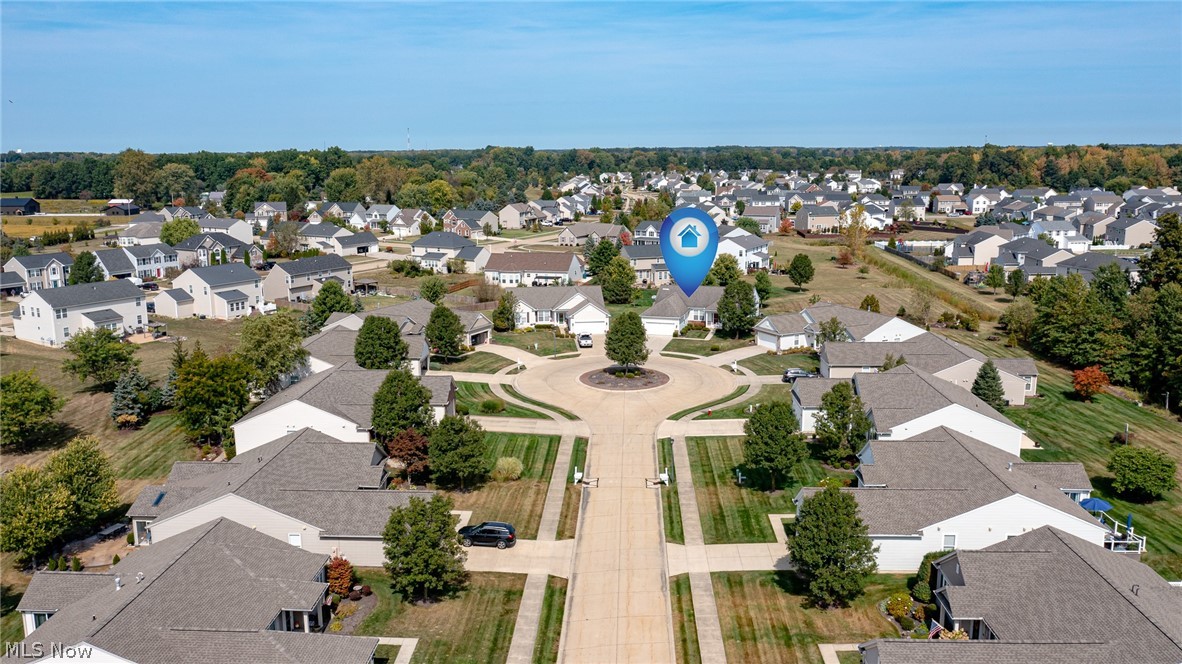 SELLERS ARE CURRENTLY HAVING THE ENTIRE INTERIOR OF THE HOME PROFESSIONALLY PAINTED AND THE CARPETS CLEANED, MAKING THIS HOME MOVE-IN READY FOR ITS NEXT OWNER! 
This highly sought-after model in North Ridgeville's premier Del Webb Active Adult Community offers exceptional value at approximately $197 per square foot versus the community average of $213 per square foot. When combined with the premium homesite, buyers are receiving exceptional value rarely available in the community.
What truly sets this home apart is its rare cul-de-sac location with expansive open green space behind the home, providing privacy, peaceful views, and a setting that would often command a $20,000–$30,000 lot premium. Unlike similar models sold on busy corner lots with limited backyard space, this home offers one of the community's most desirable homesites. Additional highlights include a rare full basement, 4-foot extended garage, hardwood floors, spacious eat-in kitchen with center island and newer stainless-steel appliances, private office/den with double doors, bright sunroom, and a spacious owner's suite with soaking tub, separate shower, and two walk-in closets. The split-bedroom floor plan offers added privacy for guests.

Major updates include a new roof (2025), furnace (2024), hot water tank (2018), and freshly painted garage with durable polyaspartic flooring, and the interior being painted. Act fast and you can choose the colors! Enjoy maintenance-free living with resort-style amenities including a 14,000-square-foot clubhouse, indoor and outdoor pools, pickleball courts, fitness center, and a vibrant social calendar that includes men & ladies Golf and poker night, and various card and board games. Conveniently located near highways, medical facilities, shopping, and dining. Schedule your private showing today!
