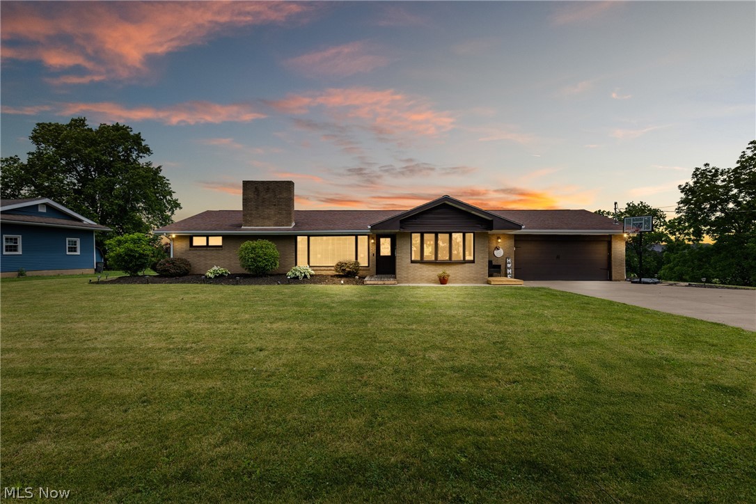 HIGHLY MOTIVATED SELLERS ARE NOW OFFERING HOME WARRANTY TO COVER ALL SYSTEMS! Welcome to a home where "move-in ready" is more than just a hopeful phrase—it's the honest truth. Completely remodeled from top to bottom, this four-bedroom, three-bathroom retreat blends fresh, modern updates with the kind of comfortable charm that makes you want to kick off your shoes and stay awhile.

Step inside and discover thoughtful spaces designed for both everyday living and easy entertaining. The four generously sized bedrooms offer plenty of room to spread out, while three full bathrooms mean nobody has to wait their turn during the morning rush. A standout perk? Two laundry hookups, because nobody enjoys hauling baskets up and down stairs.

Head downstairs to the true showstopper: a basement bar and mancave practically begging for game nights, celebrations, or simply unwinding after a long week. This dedicated entertainment space is your blank canvas for memories—whether you're hosting a crowd or savoring a quiet evening of your own.

Beyond the front door, you'll appreciate the peaceful, tucked-away setting that still keeps you connected. You're just fifteen minutes from St. Clairsville, Route 7, and the interstate, striking that sweet balance between serene country living and everyday convenience.

With its fresh renovations, flexible layout, and undeniable personality, this home checks all the boxes and then adds a few extras for good measure.

Ready to see it for yourself? Schedule your private showing today and start imagining the possibilities—your next chapter is waiting to begin.

SELLERS ARE UNDER CONTRACT TO PURCHASE ANOTHER HOME