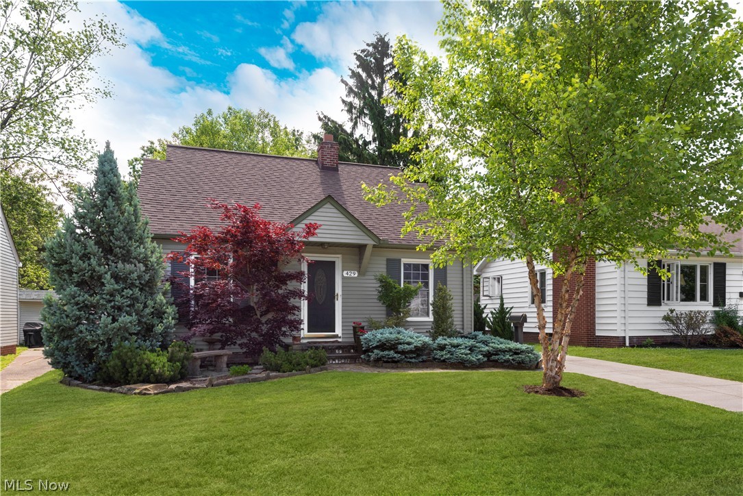 Wonderful curb appeal in this central Bay Village Cape Cod home. Nicely landscaped front yard with stone walkway. Three bedroom, two full bathroom home featuring first floor and second floor level bedrooms with full bathrooms. Hardwood flooring in living room and front first floor bedroom. Other two bedrooms, hallway, and stairway to second floor has new carpet. Beautiful staircase railing leading to upstairs bedroom hideaway with vaulted ceiling and two corner windows for great lighting. Large 13 x 8 bathroom also just steps away. Kitchen has all new flooring (gray laminate planking). Light and bright kitchen with two windows. Kitchen appliances included. Ample cabinet and counter space. Rear access door by kitchen leads to back yard green space with patio area. Great outdoor space. Full basement with two secondary rooms for storage. Glass block windows. Two car detached garage with opener. Owner recently replaced the garage roof to joists and rebuilt with new wood sheathing and roof