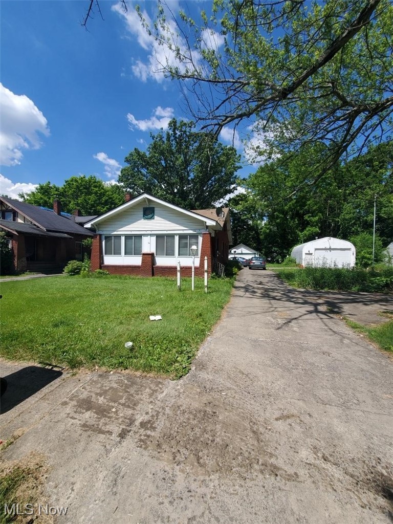 Check out this all brick single family home with a large back deck,  spacious 2 car garage. Updated electric panel, high efficiency furnace and glass block windows in the basement. Has central air and has the potential for a Mother-in-law suite. 2 bedrooms on the main floor and two upstairs.