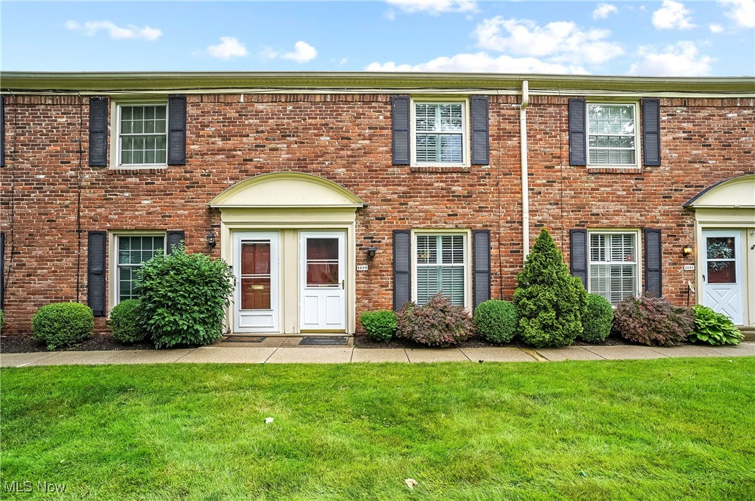 Adorable, updated 2-bedroom, 1-1/2 bath Condo with open floor plan and landscaped deck area. Large living room with engineered hardwood floors, eating area and kitchen with ceramic tile floor, kitchen with island, granite countertops, cherry cabinets, and stainless steel appliances that stay, including convection oven, fridge, dishwasher and microwave, and updated lighting. Also on first floor is a half bath with beadboard and brick walls, ceramic tile floor and pedestal sink, and also a coat closet with storage. At top of the stairs is a stack washer and dryer that stay, primary bedroom with double closet with sliding barn doors, second bedroom currently used as office/workout room. There's an updated full bathroom with step-in shower with glass doors and white subway tile, newer vanity with granite counter, and ceramic tile floor. Off the eating area are sliders that lead to covered deck and small brick patio, larger cement patio with landscaping and wood privacy fence.  There's an extra storage closet off the patio, plus a second closet with furnace and hot water tank.  Extras most of the condos don't have, built-in cabinet/pillar separating living room from dining area, linen closet outside the main bath, spigot for watering plants in the furnace closet and extensive landscaping with the covered deck. Updates include furn 2022, C/A 2017, carpet in bedrooms & stairs 2021, engineered hardwood in living room 2021, main bathroom 2021 including shower/vanity/toilet/floor/subway tile, kitchen appliances 2024, electric box 2020 with surge protection, new interior Alder wood doors and closet barn doors 2021 (left unstained, in natural state), unit repainted within past 2 years, all newer windows, plantation shutters. Home warranty included. There are two walkways from parking lot and assigned spot to front and back entrances, plus several visitor spots. Nothing for you to do but move in and enjoy the assoc. pool and tennis/pickleball courts. Make your appointment today!